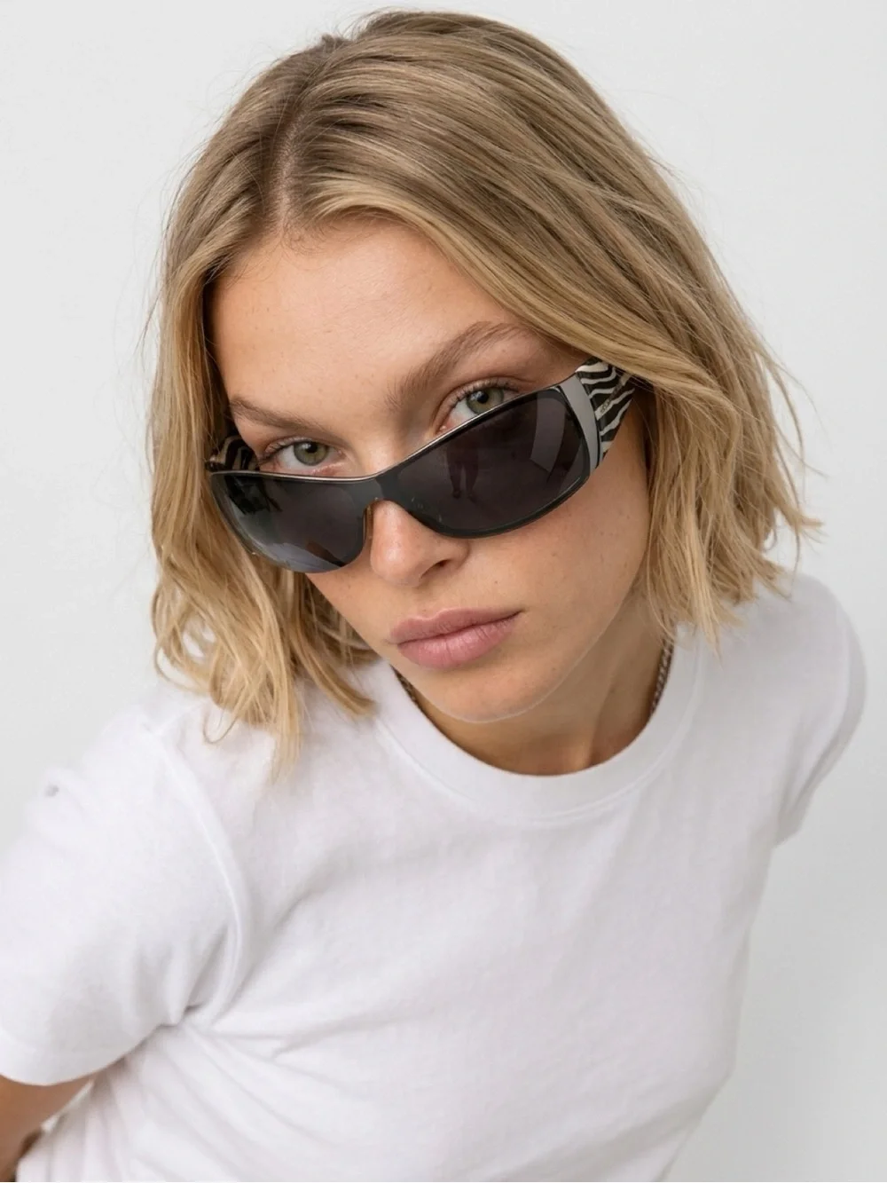 Dolce & Gabbana Black Shield Sunglasses with Zebra-Print Temples